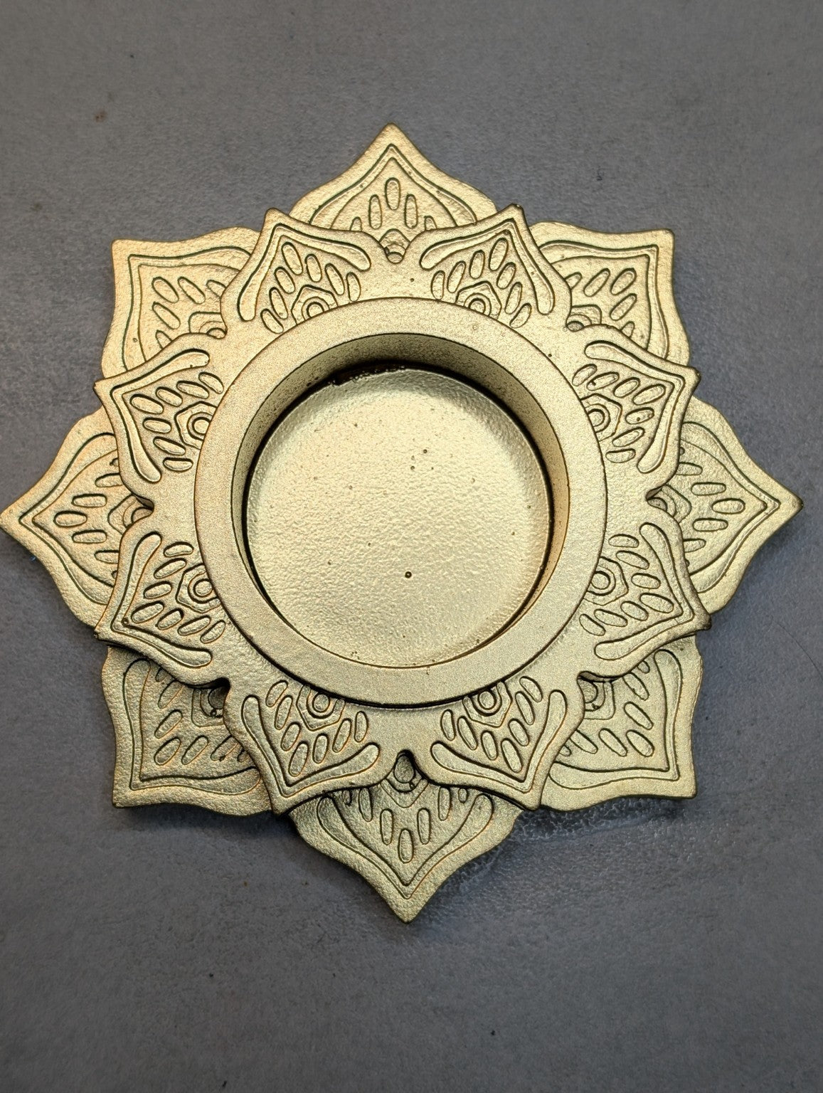Top view of the Metallic Gold Jesmonite mandala tealight holder, showing layered lotus petals and a central recess.